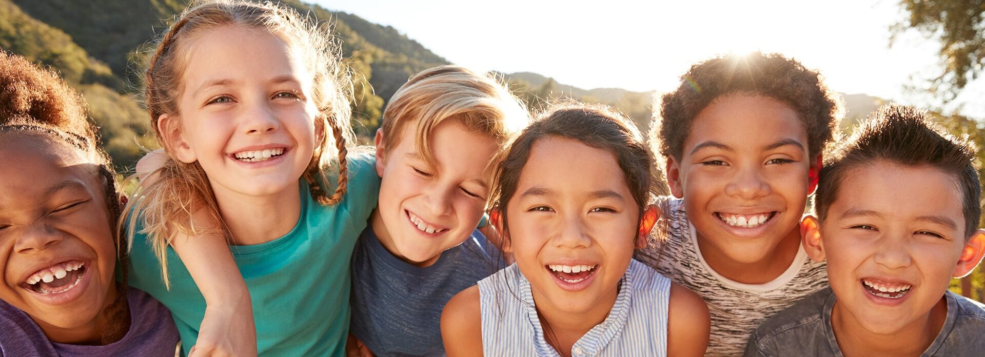 Kids Smiling At Camera